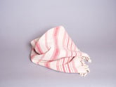Hand loomed cotton beach towel.