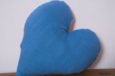 Heart shaped cushion, hand embroidered by a association of women in Cape Town.