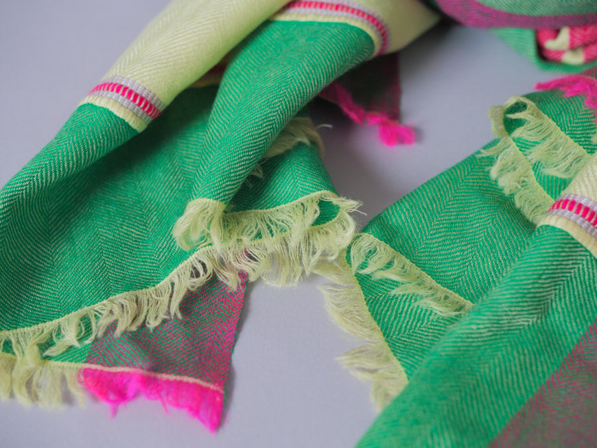 Hand loomed fine wool scarf, bright green and pink.