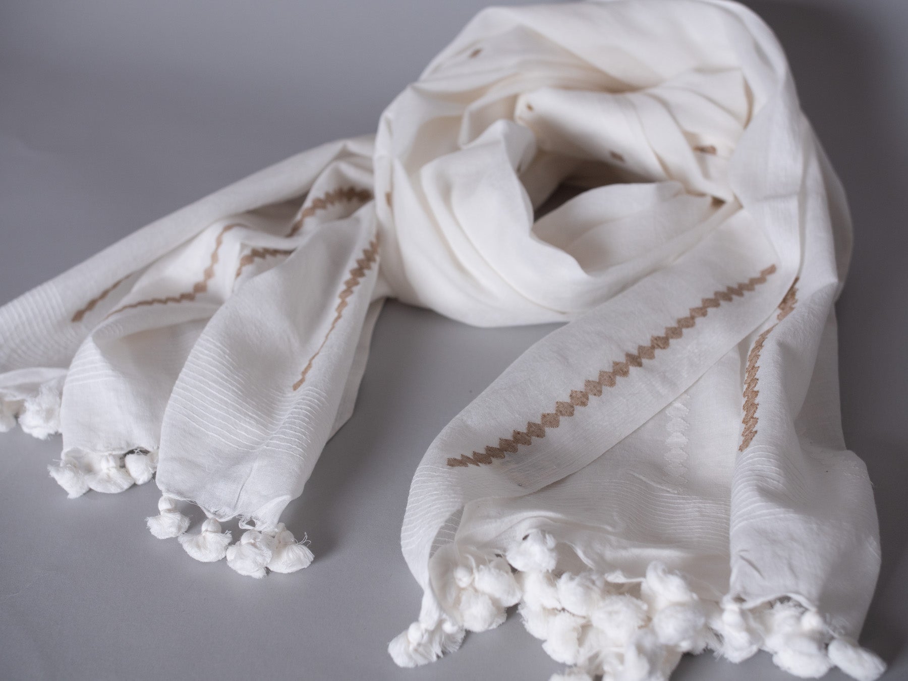 Delicate hand loomed white dupatta in 100% cotton