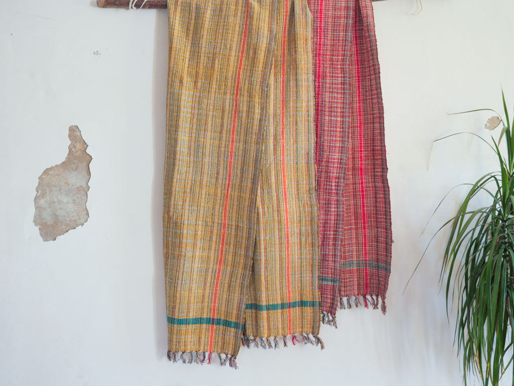 Handwoven cotton towel or throw, pink. Mixed-yarn weave.