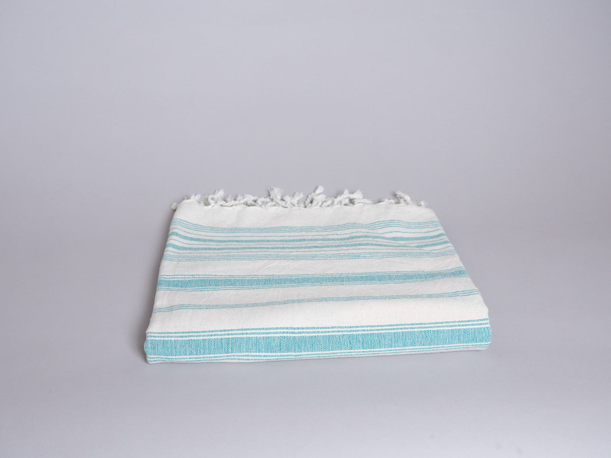 Serviette tissé main en coton coleur vert.