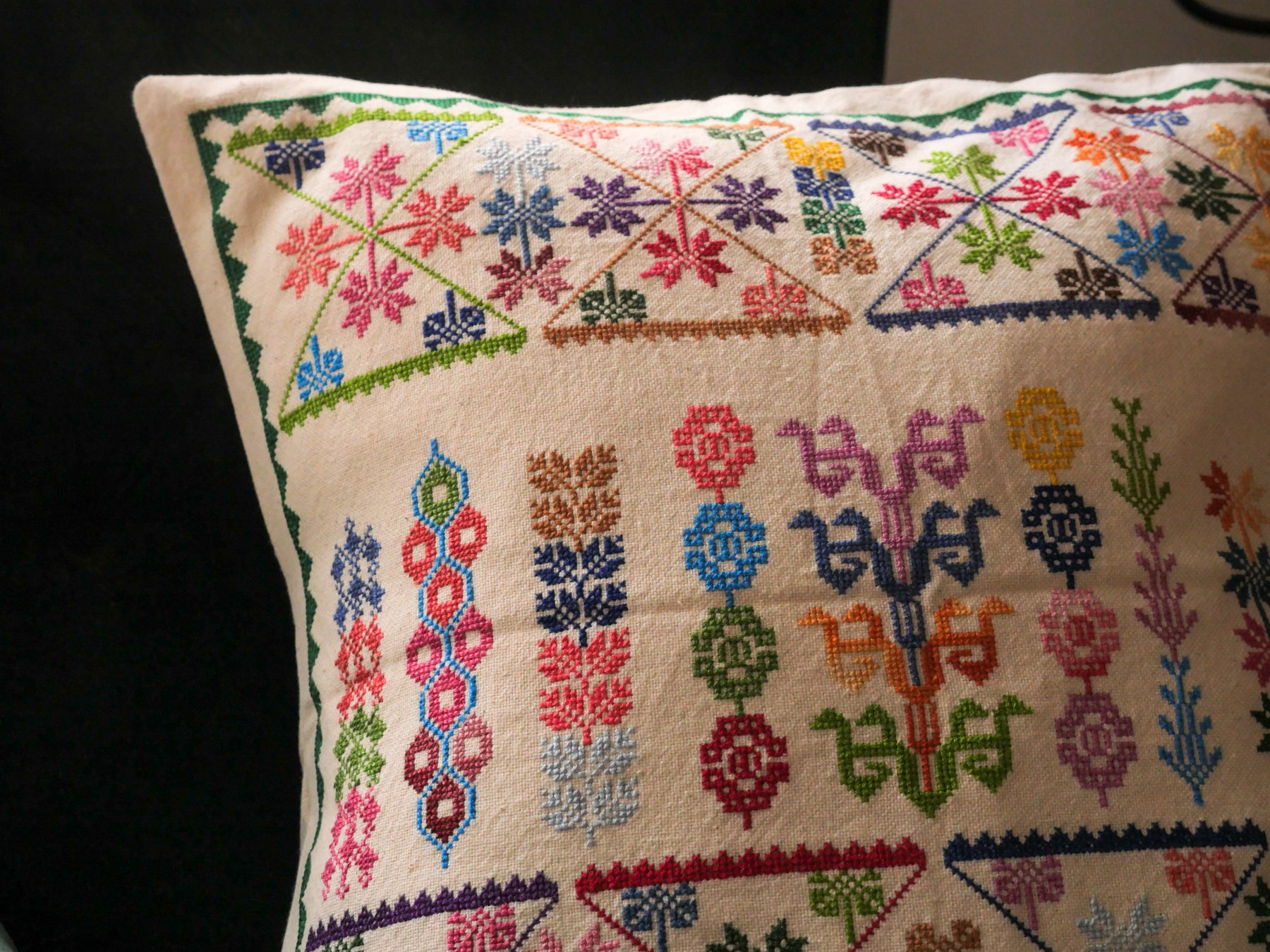 Hand embroidered cushion cover.