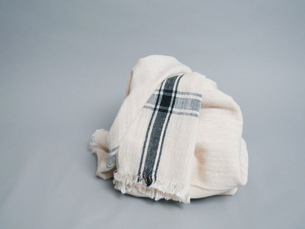 Handwoven towel: ecru cotton with black edge