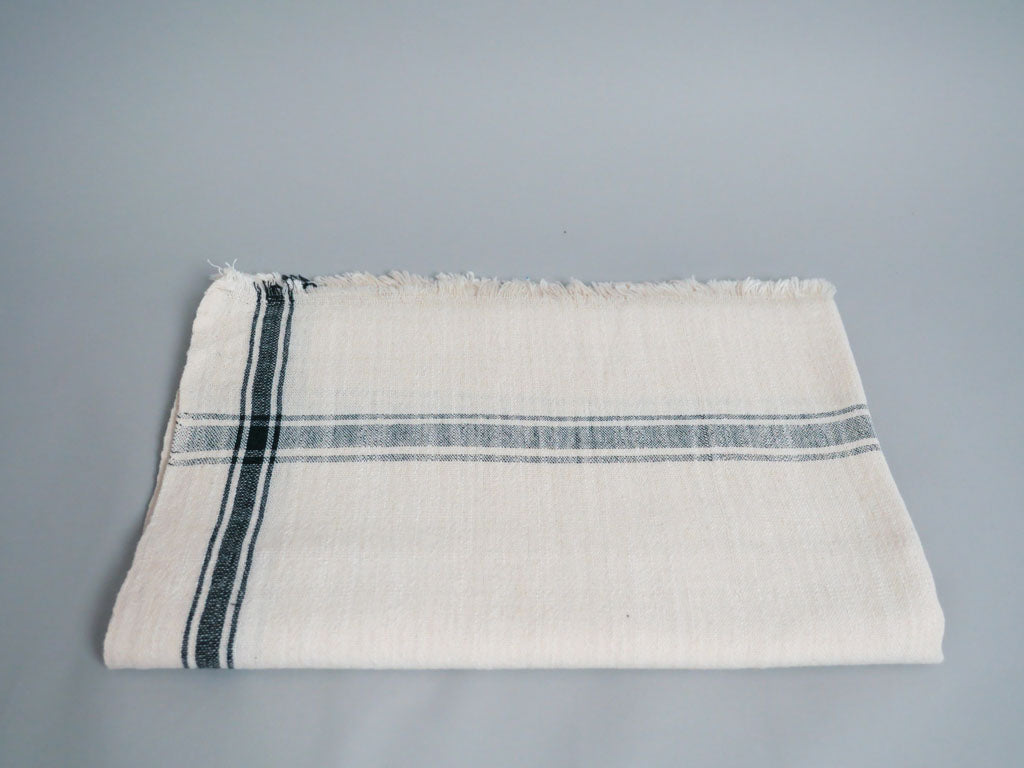 Handwoven towel: ecru cotton with black edge