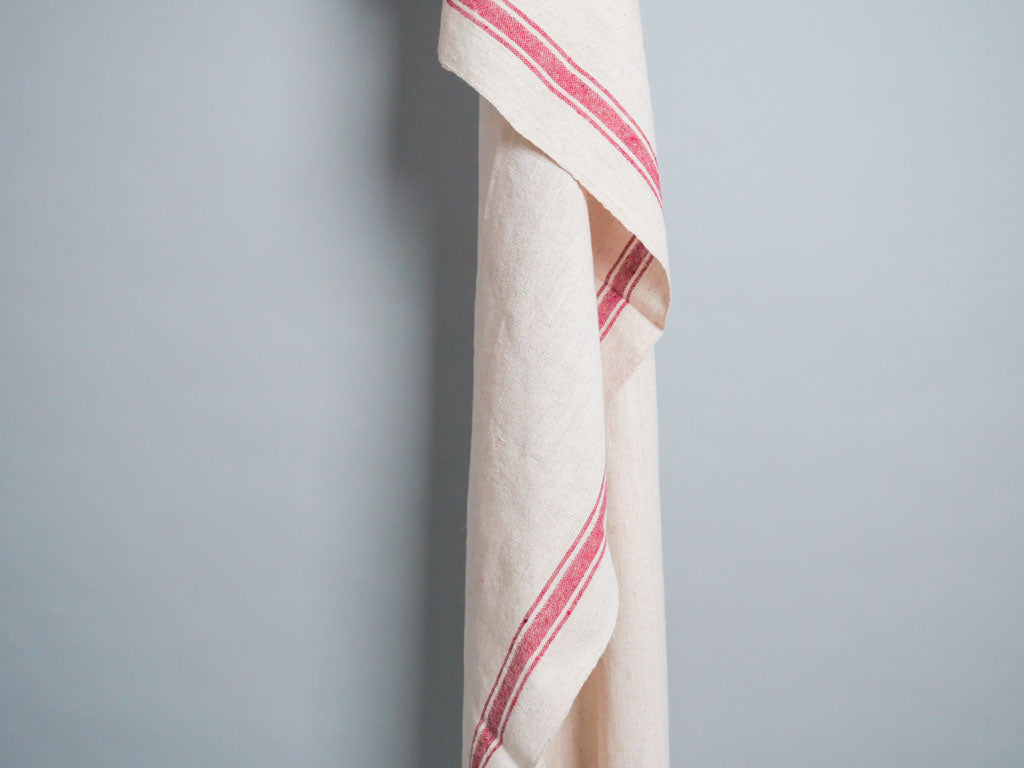 Handwoven towel: ecru cotton with pink edge
