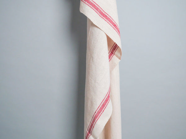 Handwoven towel: ecru cotton with pink edge