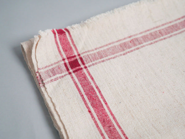 Handwoven towel: ecru cotton with pink edge