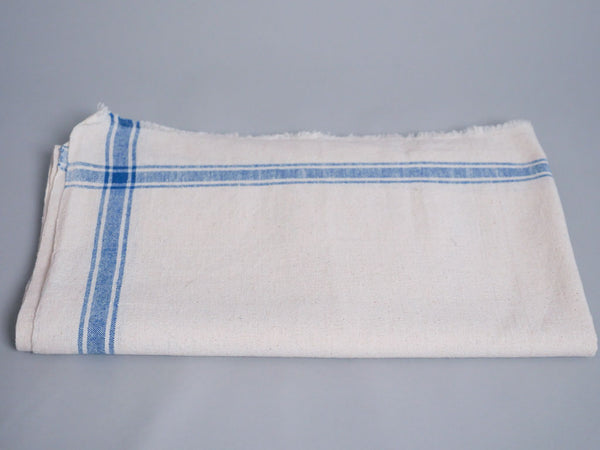 Handwoven towel: ecru cotton with blue edge