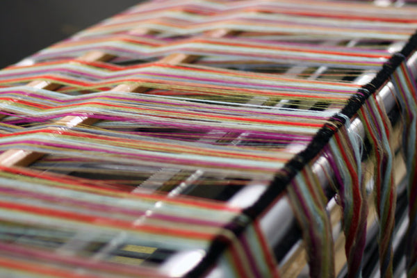 Fabrication de plaids en laine.