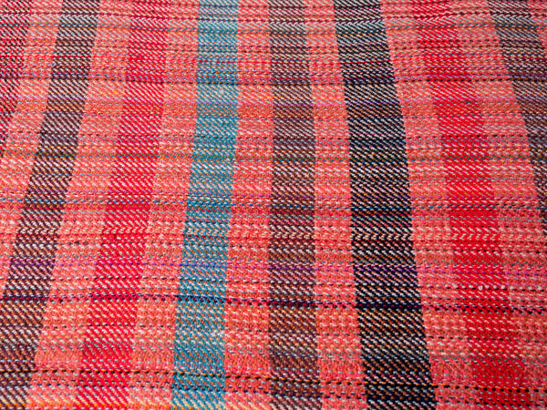 Plaid en laine recyclé tissé main.