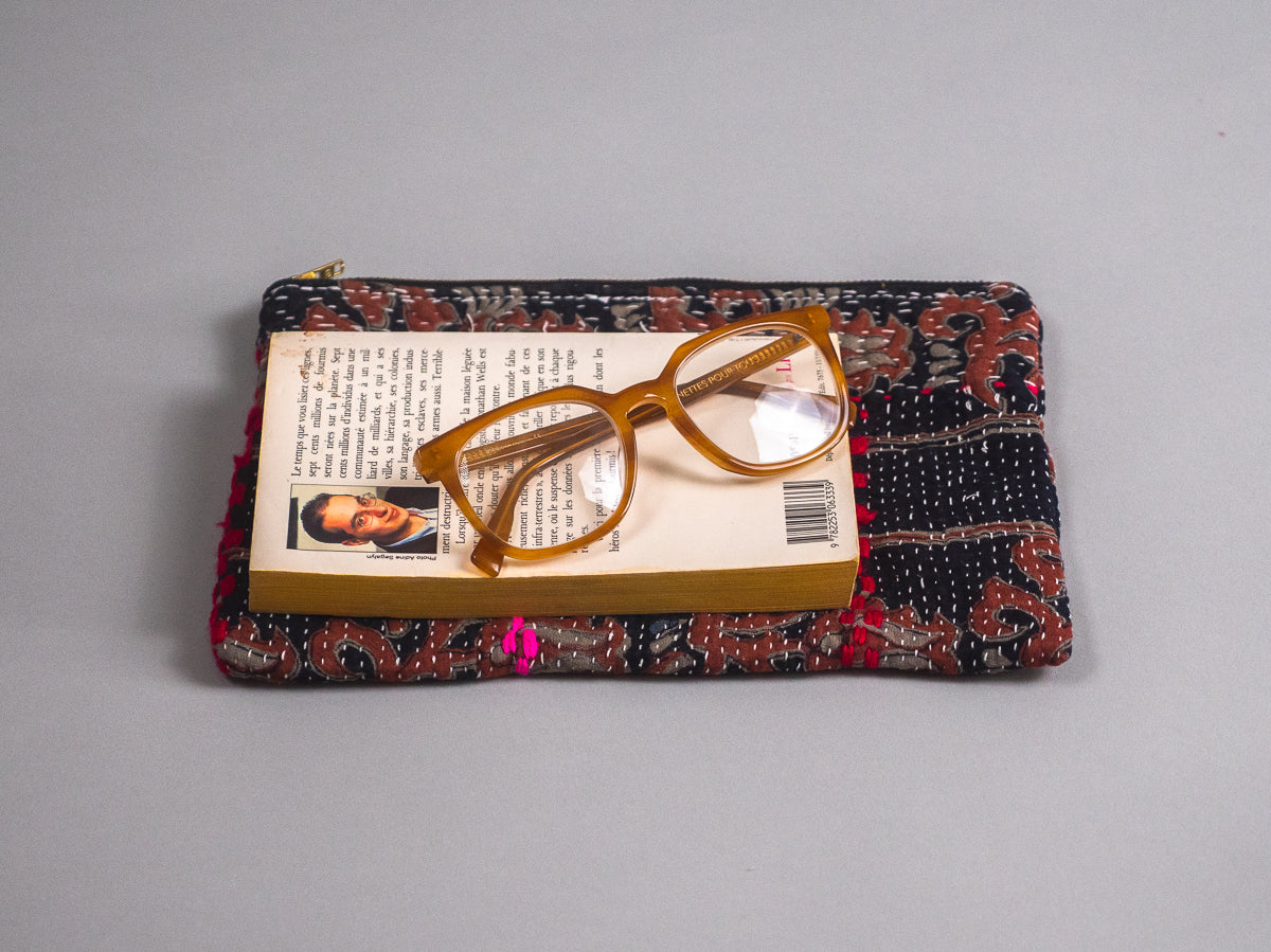 Kantha pouch in recycled material.