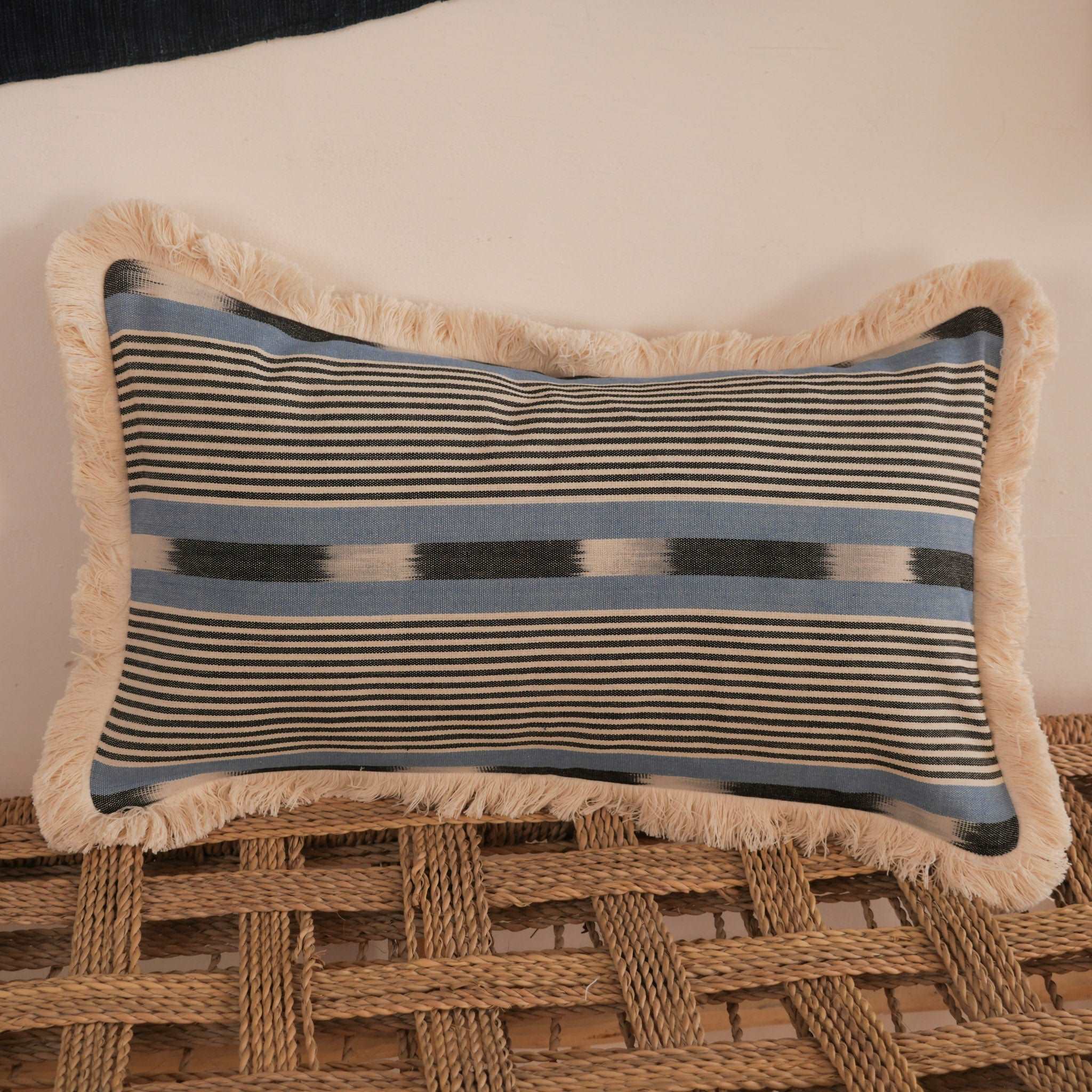 Luxurious cushions handmade in Paris for Storie from a beautiful, thick, hand-woven cotton in Burkina Faso. 
