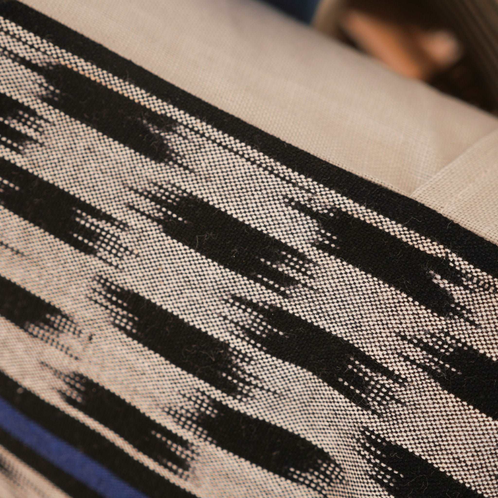 Luxurious cushions are handmade in Paris for Storie from a beautiful, thick, hand-woven cotton in Burkina Faso.
