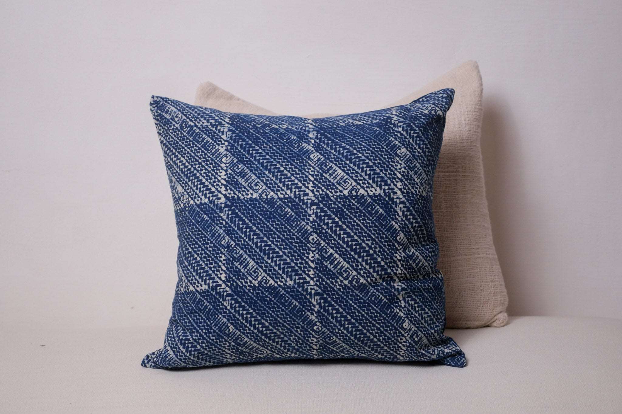 Cushion naturally dyed in indigo, wax relief dye.