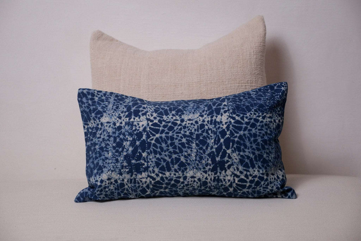 Naturally dyed indigo cotton cushion cover, motif created using wax.