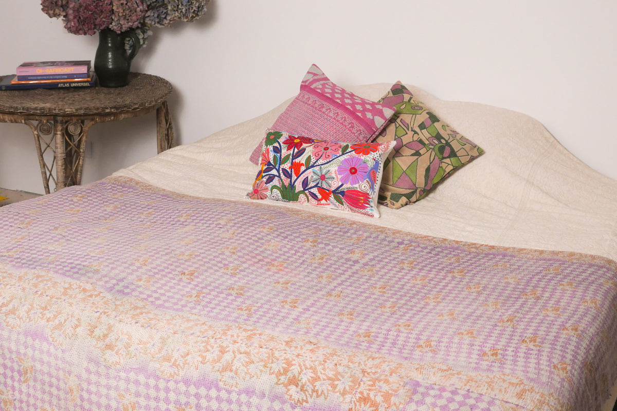 Bedspread made with recycled cotton, hand stitched.