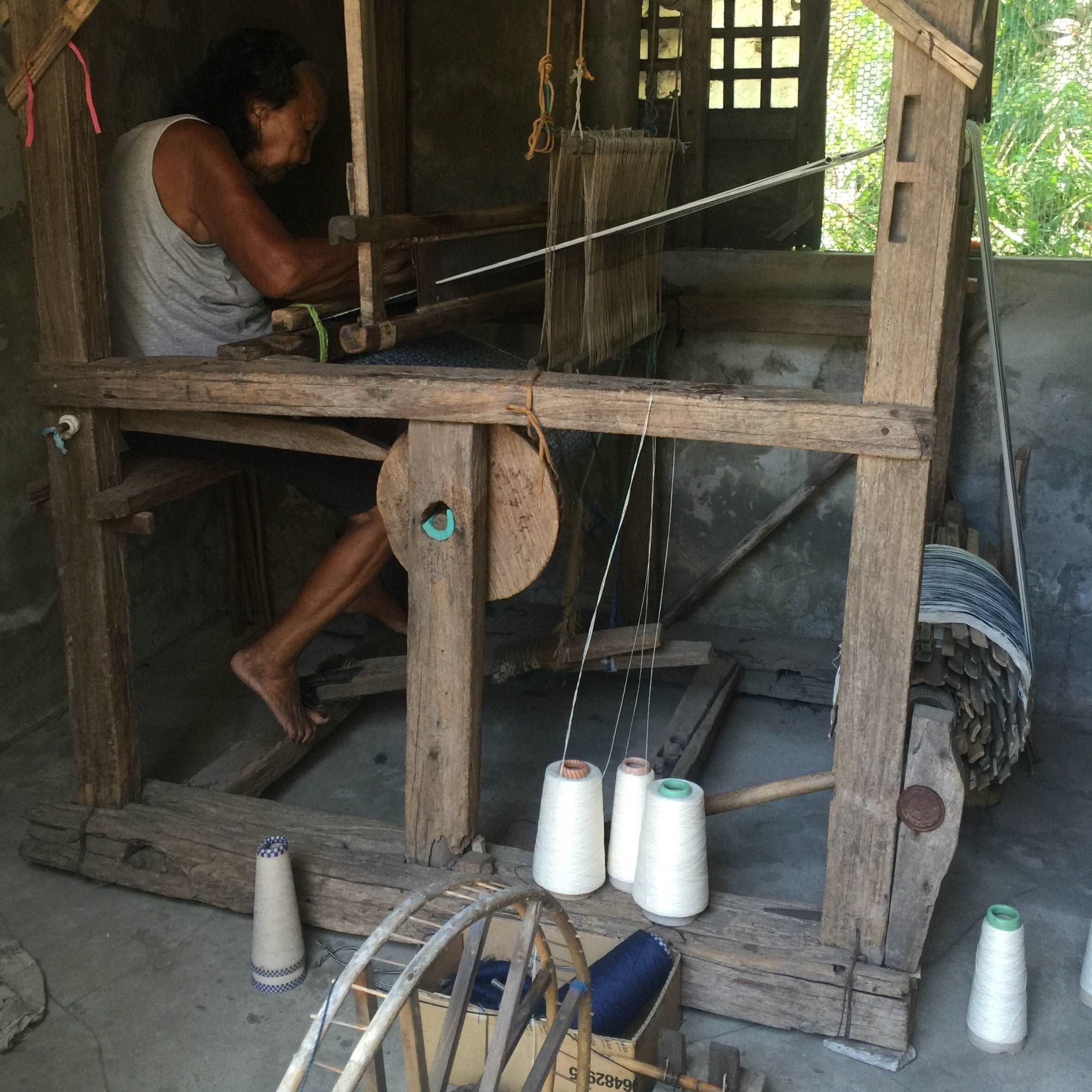 Weaving graphic Binakol hand loomed cotton.