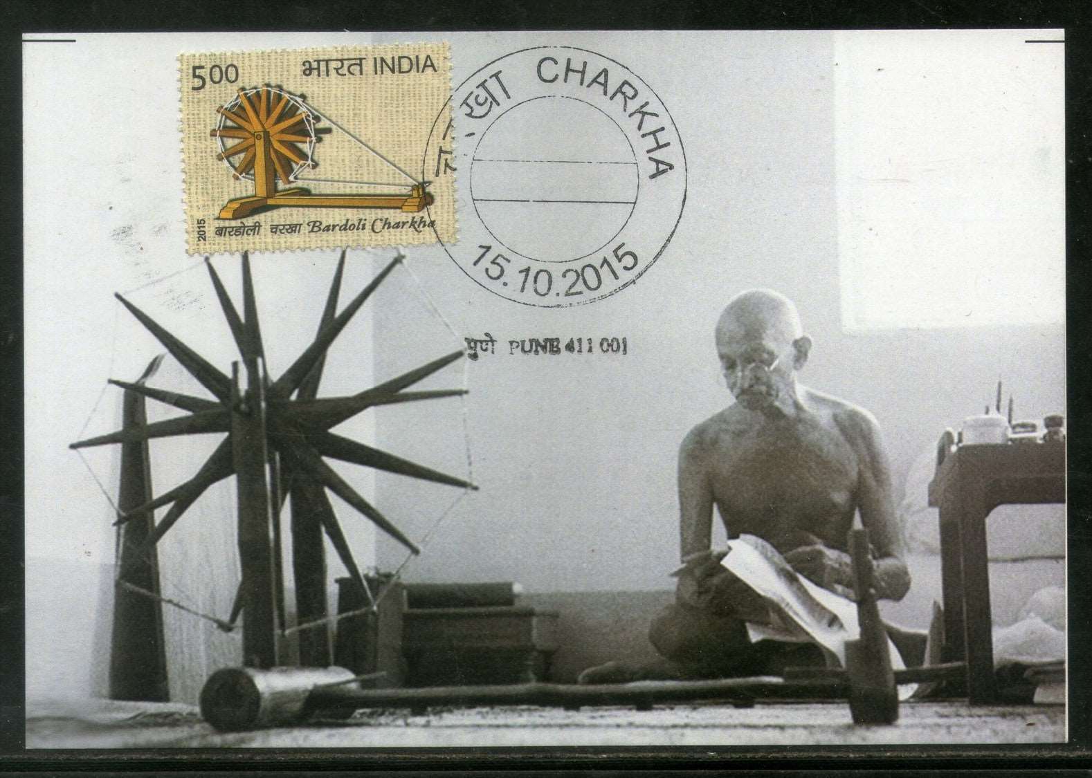 Mahatma Gandhi spinning hand made cotton thread on manual spinning wheel charkha 