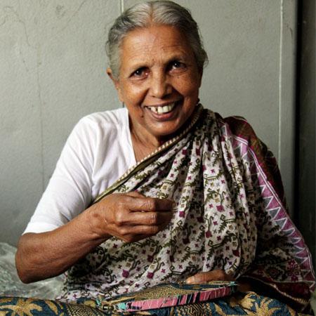 Kantha artisan, Bangladesh. Hand sewn kantha, fair trade.
